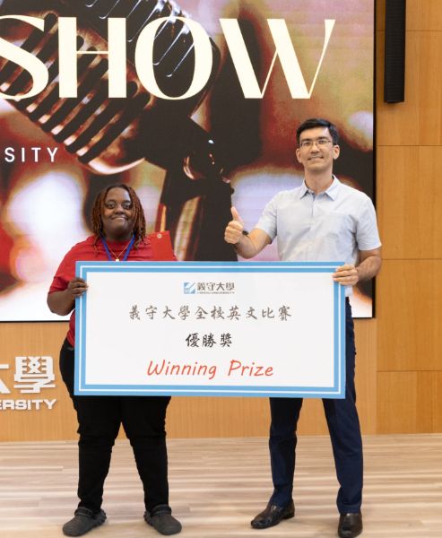 團體組-歌唱第一名-普麗（泰國）、紙屋湧太郎（日本）(照片來源：義守大學提供)。